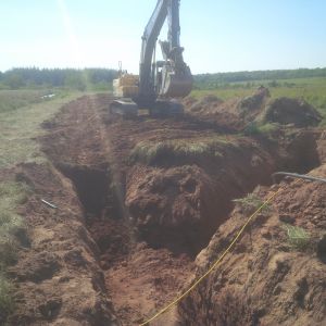 Excavating ground loop geothermal