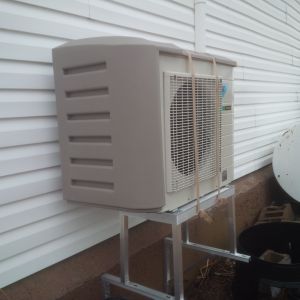 mini-split heat pump snow cover